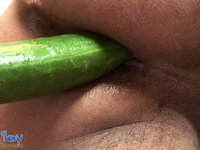 Sex-hungry twink’s ass gets a long cucumber for anal pleasure